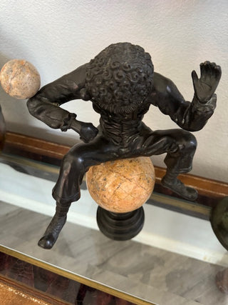 Theodore Alexander   Verdigris Patina Brass Jester on Ball