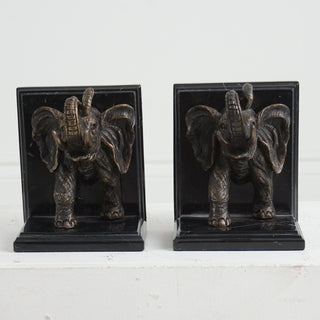 Elephant bookends on marble base